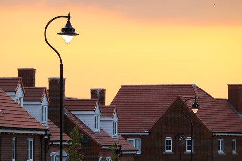 A roof top  view of a residential street.