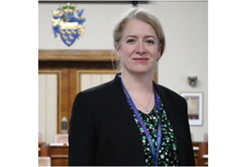 Anna Raleigh, Director of Public Health in the council chambers.