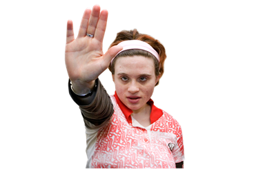A woman holding her hand up to say stop. 